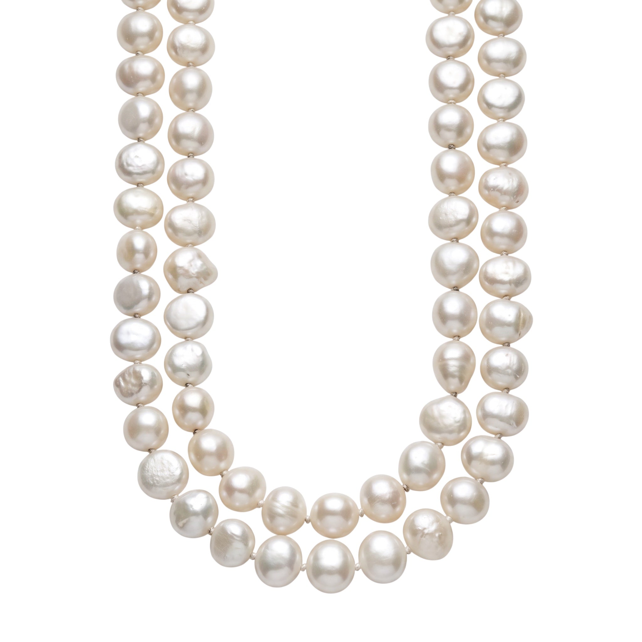 Blue Dragonfly Creations long white baroque freshwater pearl necklace with hand-knotted detailing between each pearl.