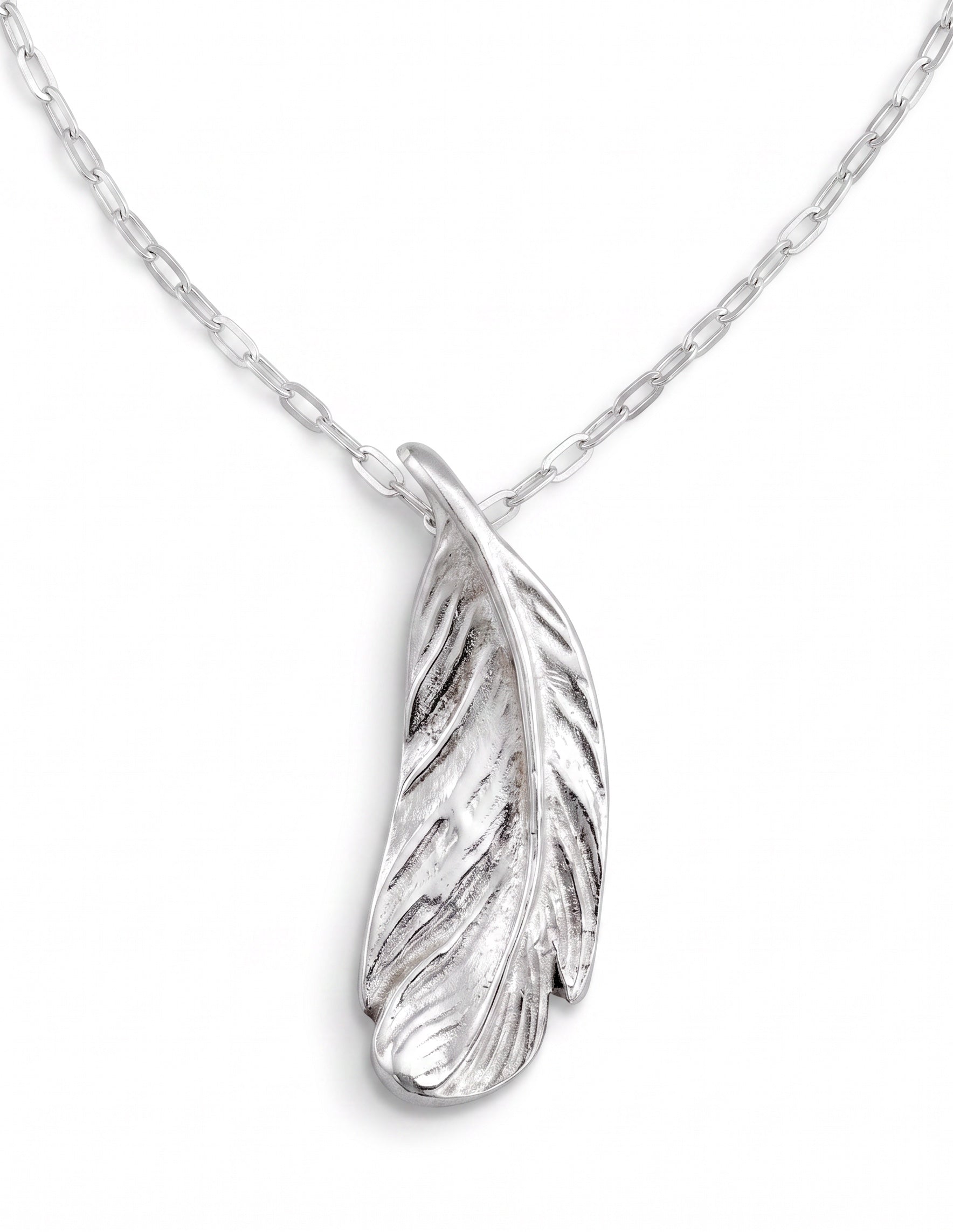 Blue Dragonfly Creations handcrafted fine silver feather pendant necklace with delicate textured details on a chain