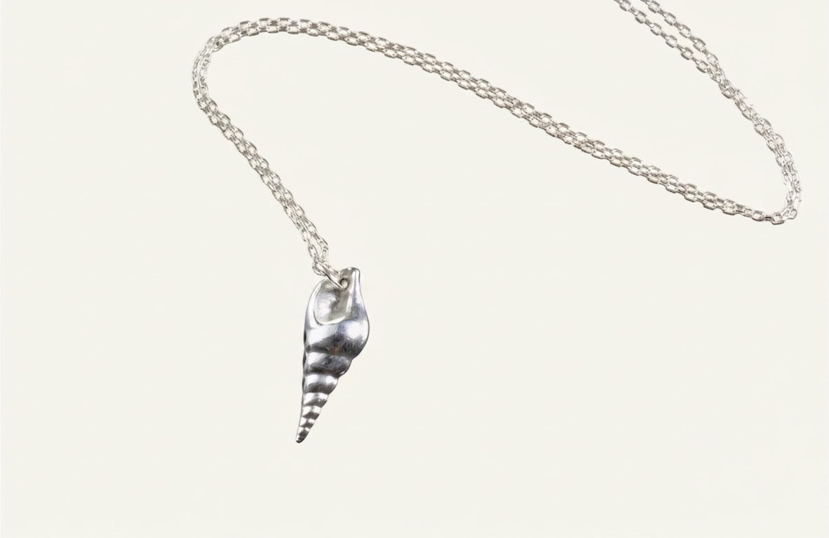 Blue Dragonfly Creations fine 999 silver seashell pendant necklace with a polished finish on a sterling silver chain.