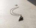 Blue Dragonfly Creations fine silver seashell pendant necklace with a polished finish on a delicate sterling chain.
