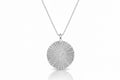 Blue Dragonfly Creations fine silver round pendant necklace with textured sunburst lines on a sterling silver chain.