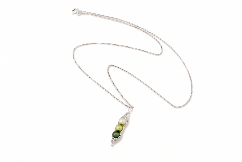 Blue Dragonfly Creations pea pod necklace with three green freshwater pearls in a hand-woven sterling silver wire pod.