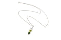 Blue Dragonfly Creations sterling silver pea pod necklace with three green freshwater pearls in a wire-wrapped pendant.