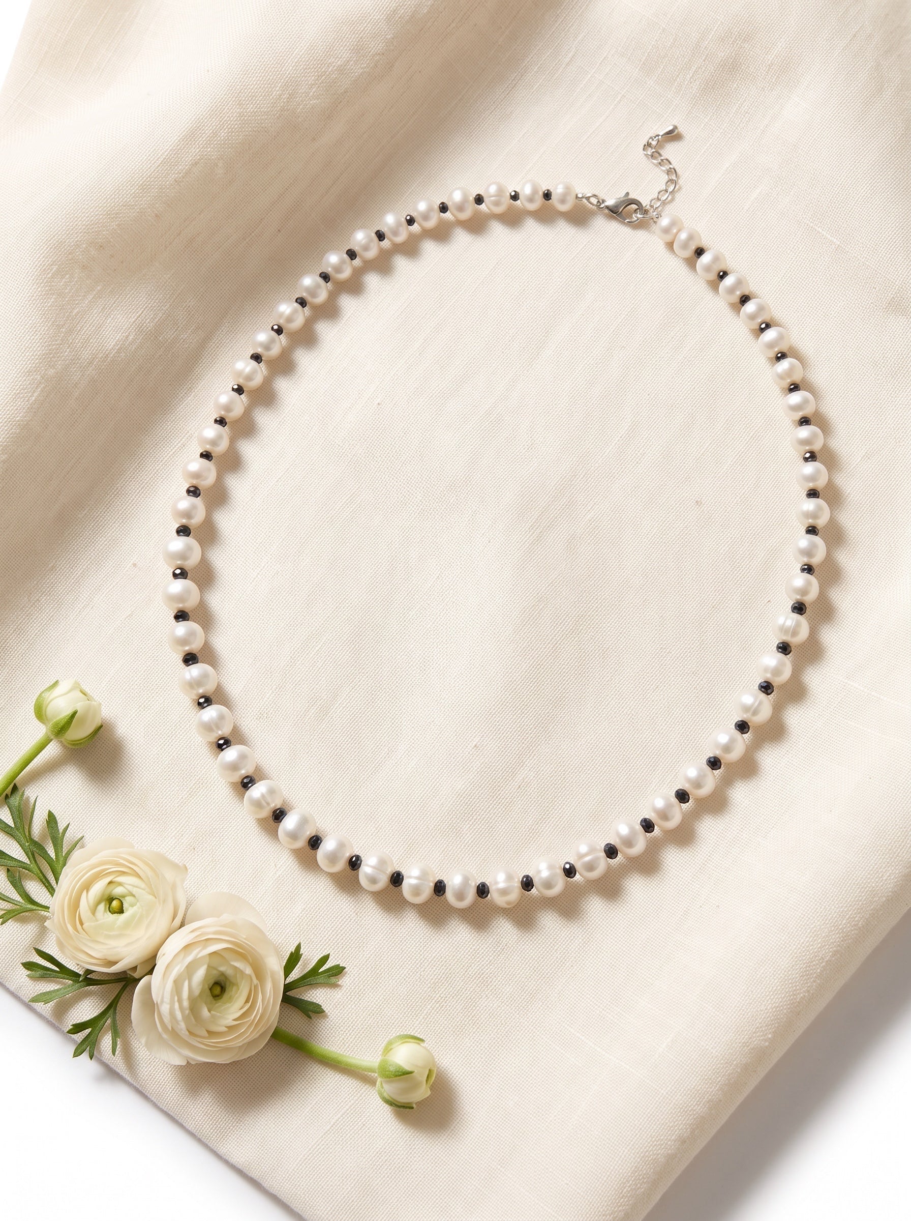 Blue Dragonfly Creations white freshwater pearl necklace with faceted black beads and sterling silver clasp