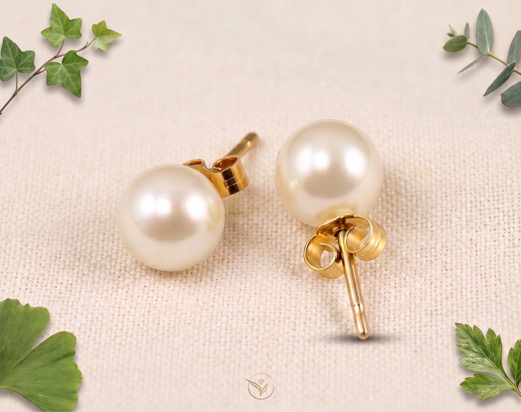 Blue Dragonfly Creations round white freshwater pearl stud earrings set in yellow gold with butterfly backs