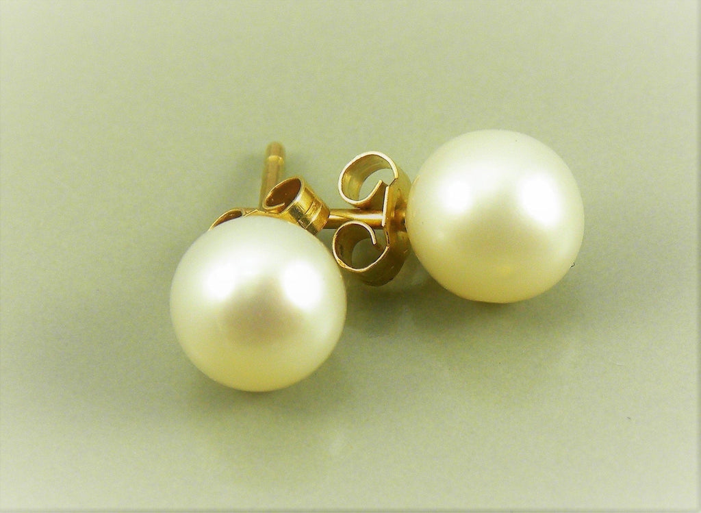 Blue Dragonfly Creations classic round pearl stud earrings with lustrous white pearls and gold-tone posts.