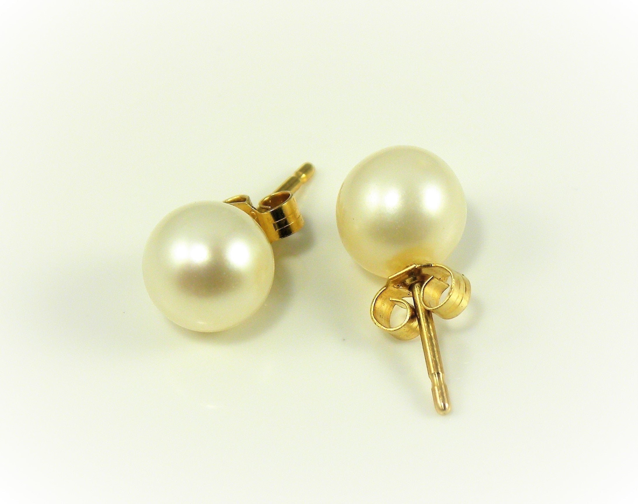Blue Dragonfly Creations classic round pearl stud earrings with lustrous white pearls and gold-tone posts.