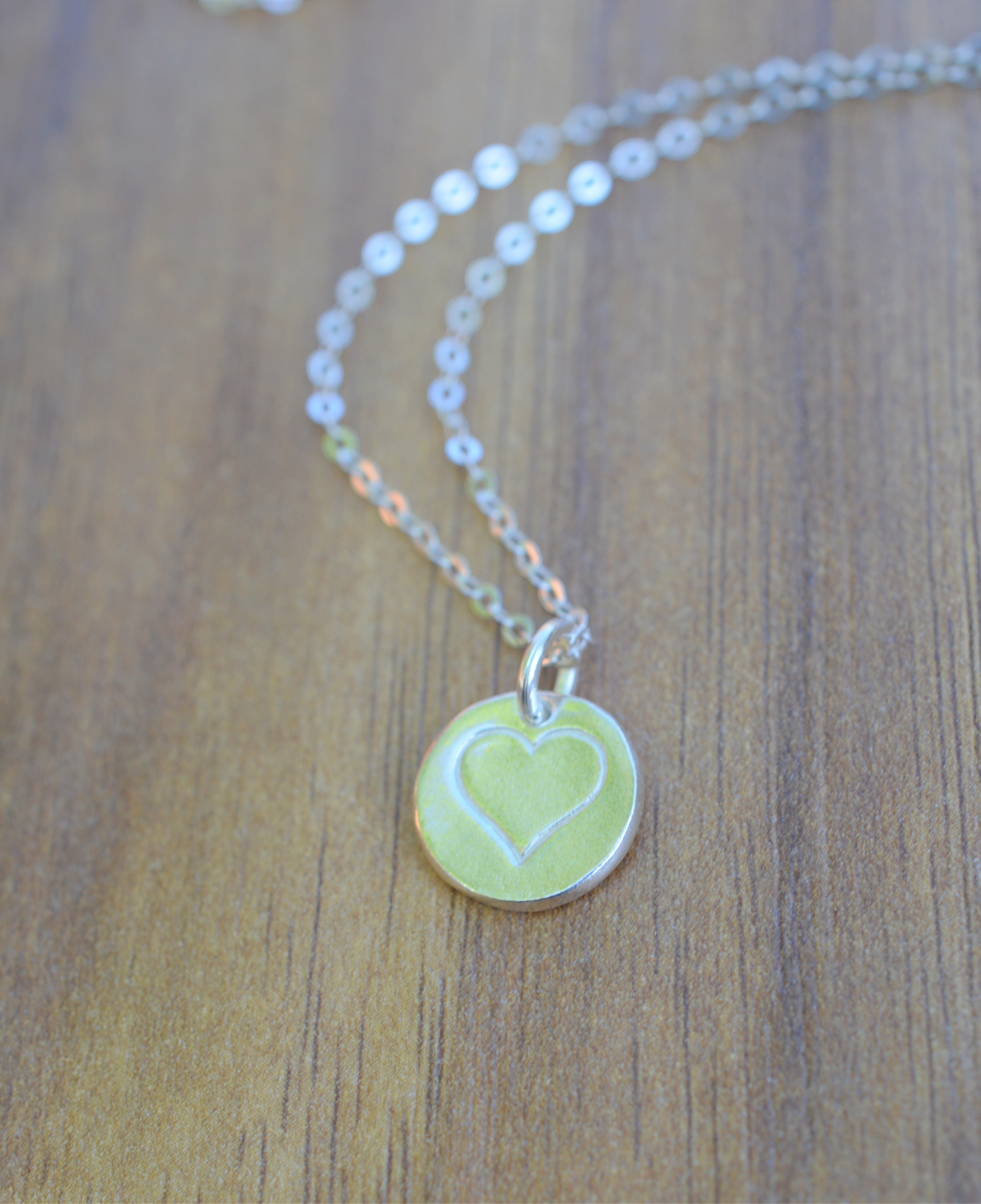 Blue Dragonfly Creations minimalist fine silver heart pendant necklace on a delicate 925 sterling silver chain.