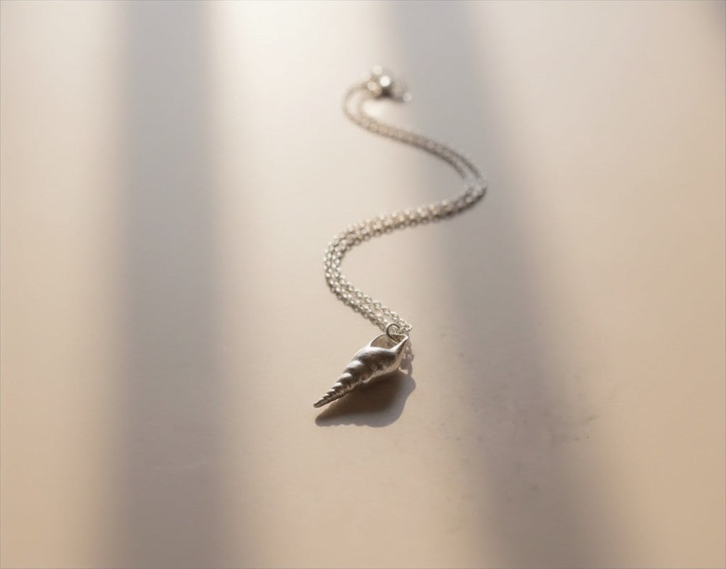Blue Dragonfly Creations fine silver seashell pendant necklace with a polished finish on a delicate sterling chain.