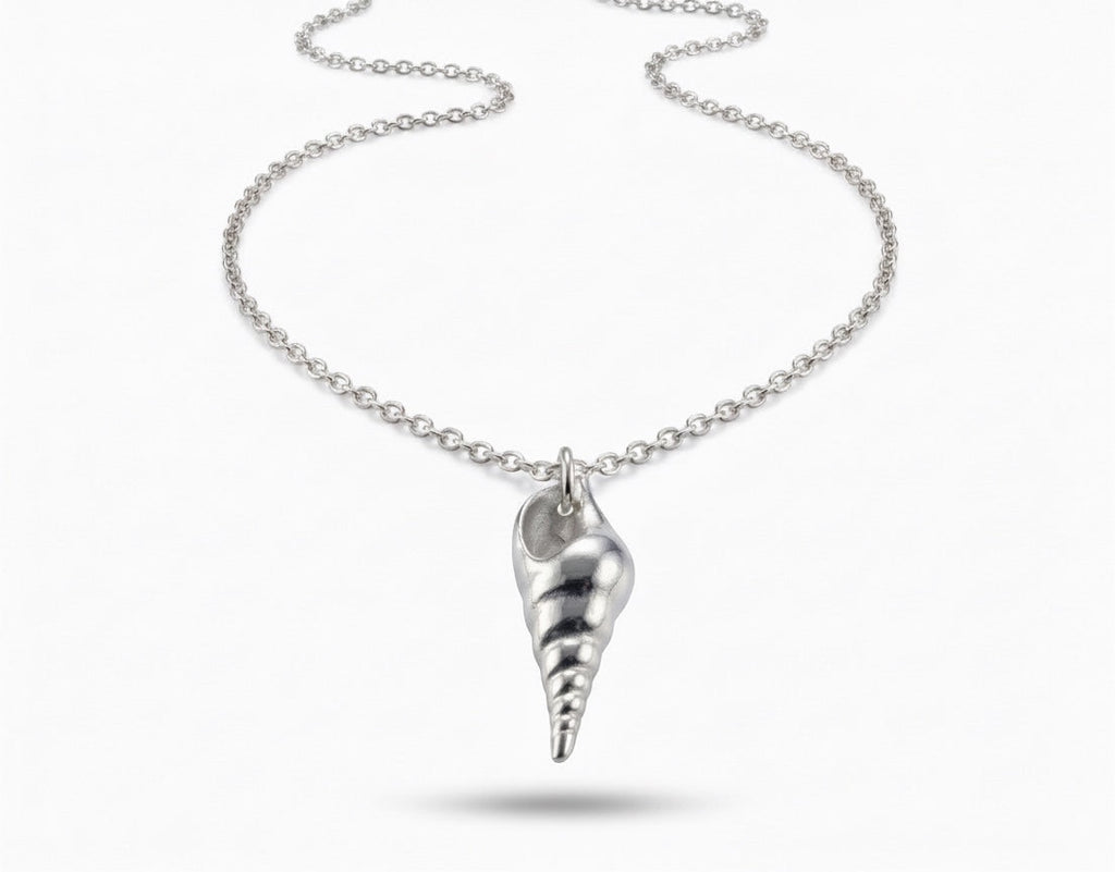 Blue Dragonfly Creations fine 999 silver seashell pendant necklace with a polished finish on a sterling silver chain.