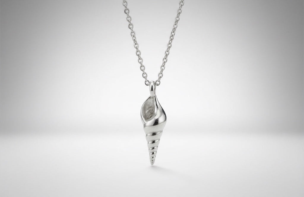 Blue Dragonfly Creations fine silver seashell pendant necklace with a polished finish on a sterling silver chain.