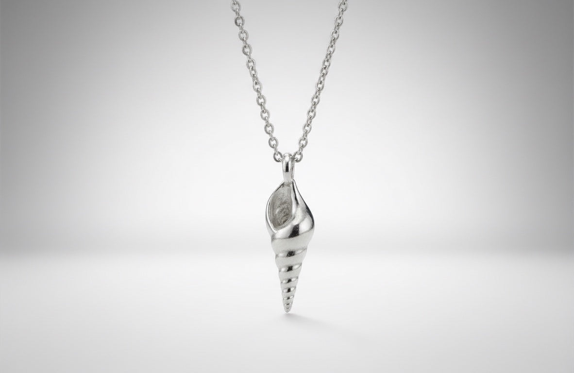 Blue Dragonfly Creations fine silver seashell pendant necklace with a polished finish on a sterling silver chain.
