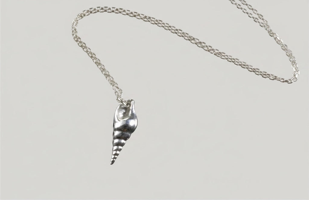 Blue Dragonfly Creations fine 999 silver seashell pendant on a delicate sterling silver chain with a mirror polish.