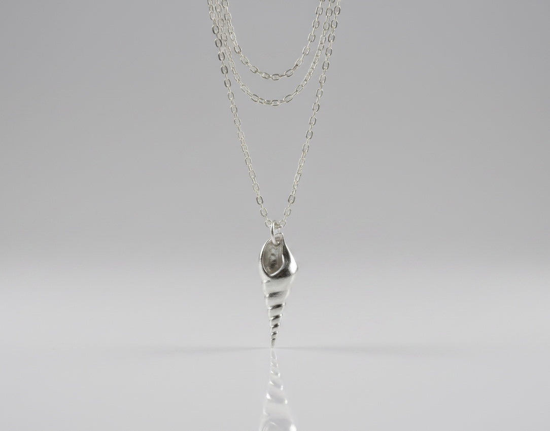 Blue Dragonfly Creations fine 999 silver seashell pendant necklace on a delicate sterling silver chain.