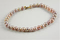 Natural Freshwater Pearl Bracelet with 10 ct Gold clasp, hand knotted