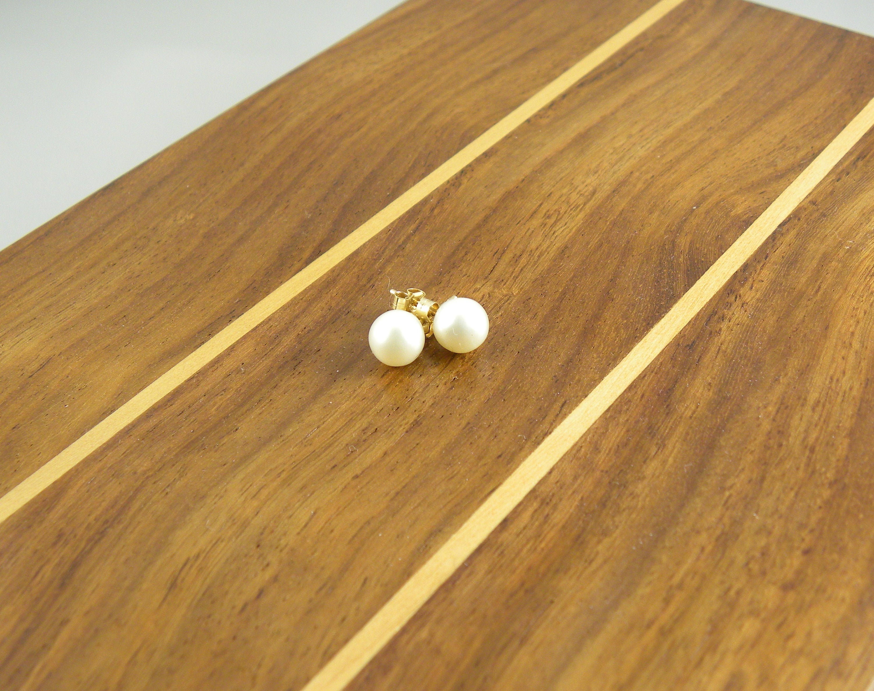 Round White Freshwater Pearls Stud Earrings on Gold