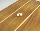 Round White Freshwater Pearls Stud Earrings on Gold