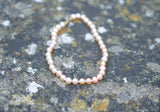 Natural Freshwater Pearl bracelet with 10ct Gold clasp, hand knotted