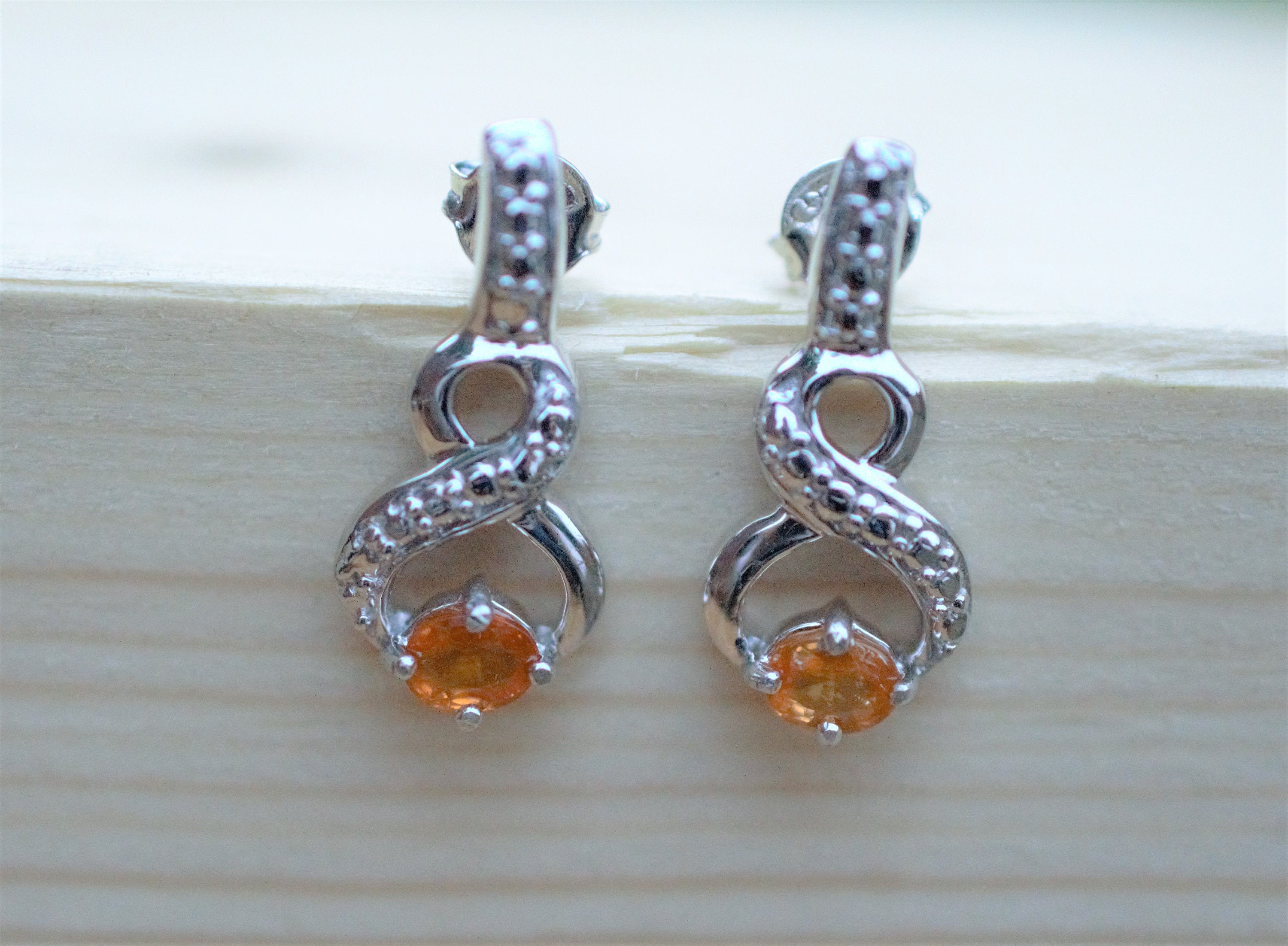 Hessonite Garnet & Sterling Silver Stud Earrings, Natural Orange Gemstone with Eternal Symbol