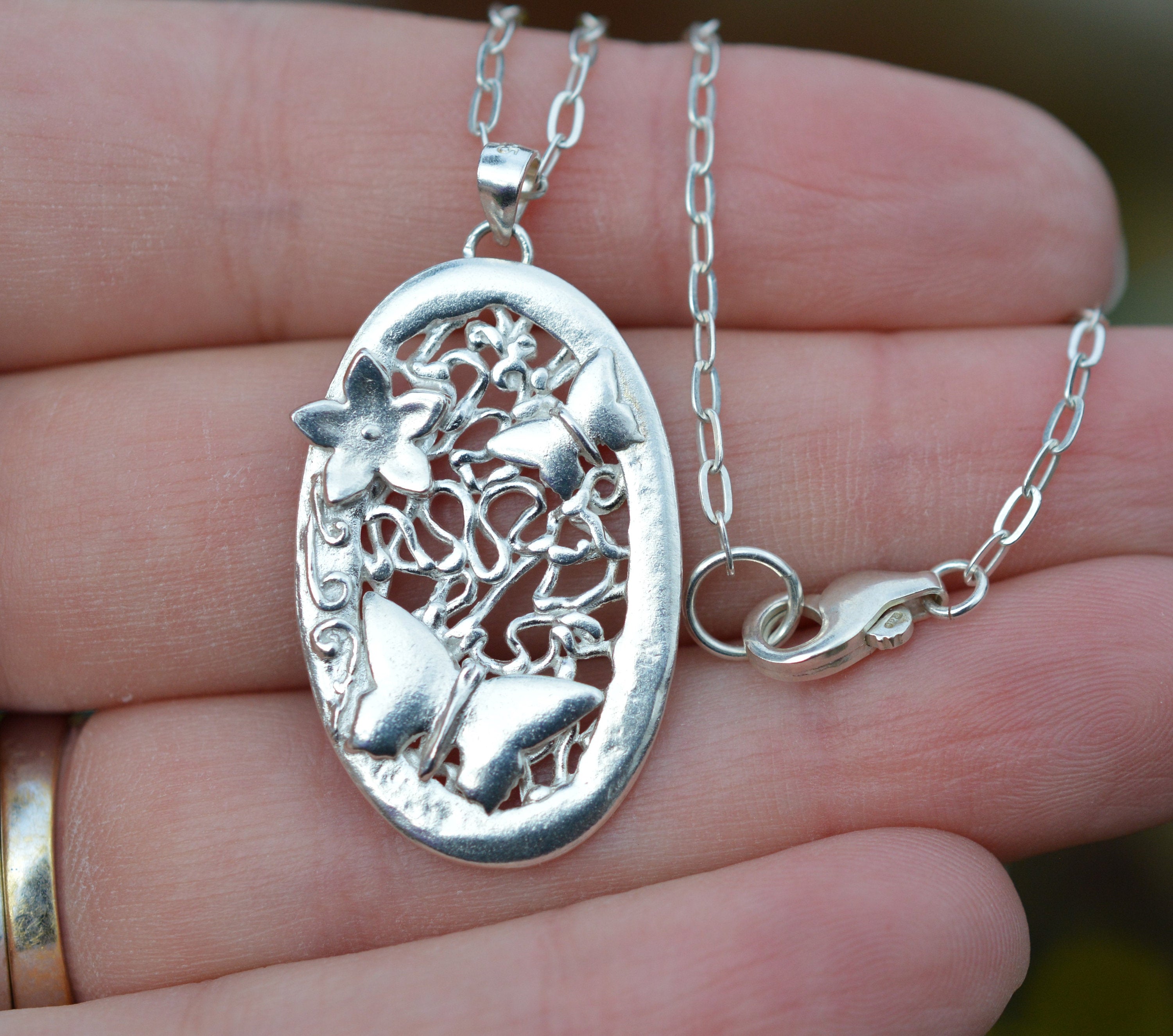 Butterflies & Flower Oval Pendant Necklace made from Fine and Sterling Silver