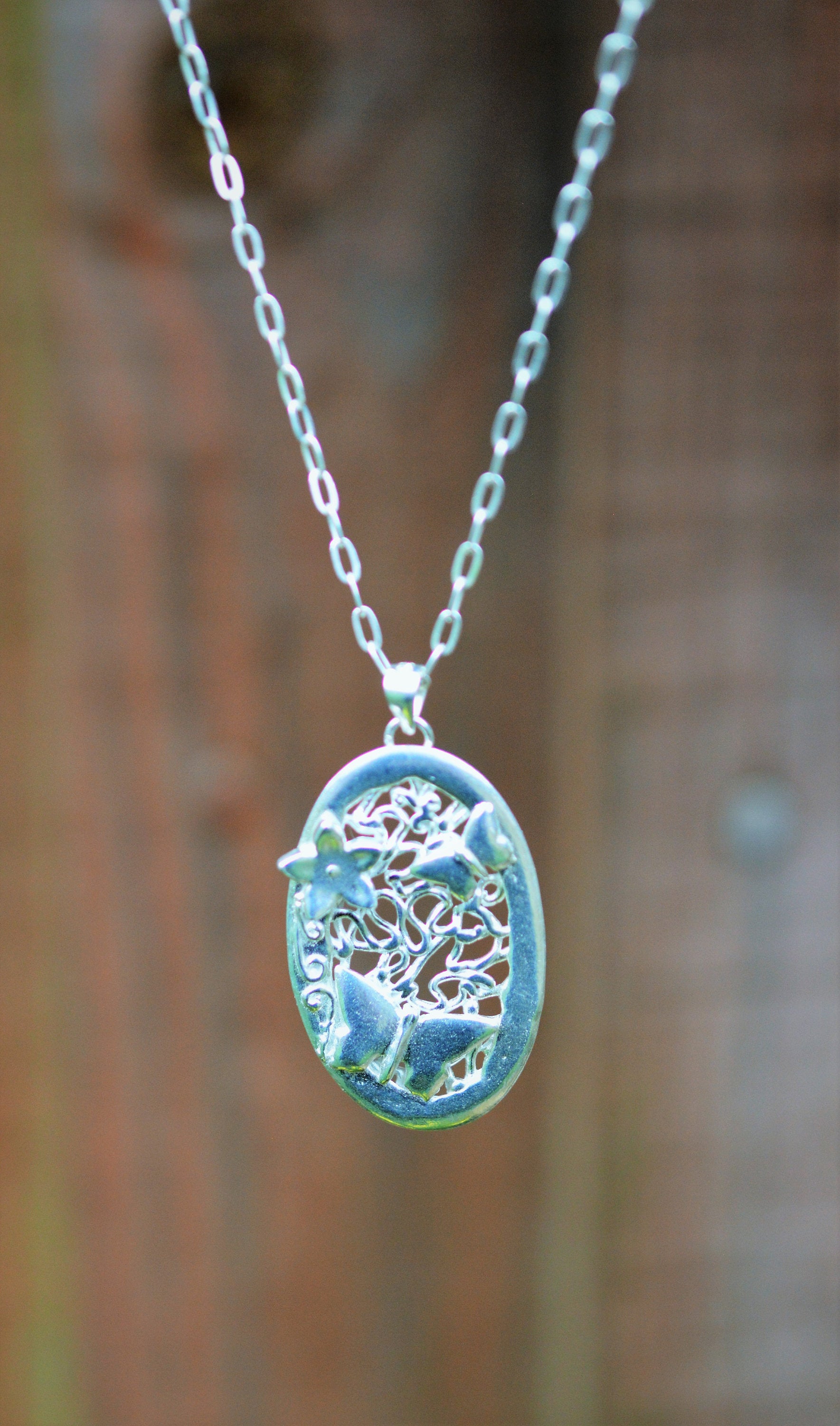 Butterflies & Flower Oval Pendant Necklace made from Fine and Sterling Silver